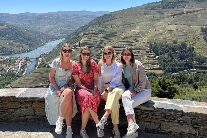Douro Valley Tour - 3 Wine tastings, Lunch & river Cruise - Peso da Régua: coffee, river views, and a classic bridge photo