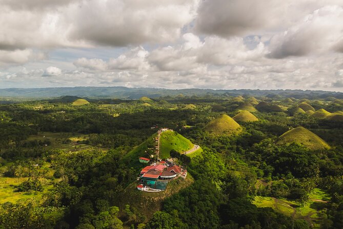Famous Bohol Chocolate Hills Loboc River Cruise Tarsier Tour - Twin Hanging Bridge across the Sipatan River: views that justify the 45 minutes