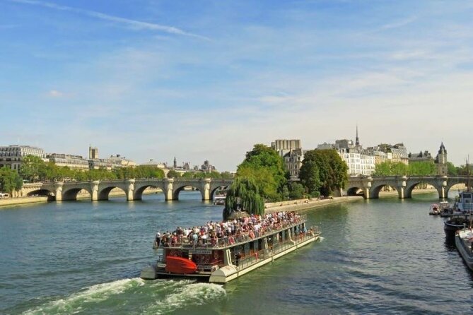 Grevin Wax Museum in Paris and Seine River Cruise Tickets - Bateaux Parisiens Seine Cruise: 1 hour from the Eiffel Tower base with audio