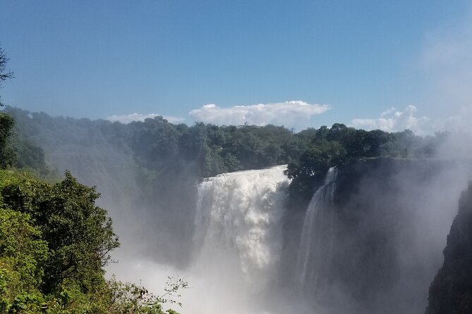 Guided Falls Tour & Zambezi River Cruise Combo - Day 1: a guided Zambezi sunset cruise with wildlife and birds at eye level