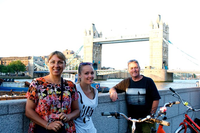 Highlights of Royal London Bike Tour with River Cruise Package - London Bridge rhyme, Tower Bridge crossing, and the traffic reality check
