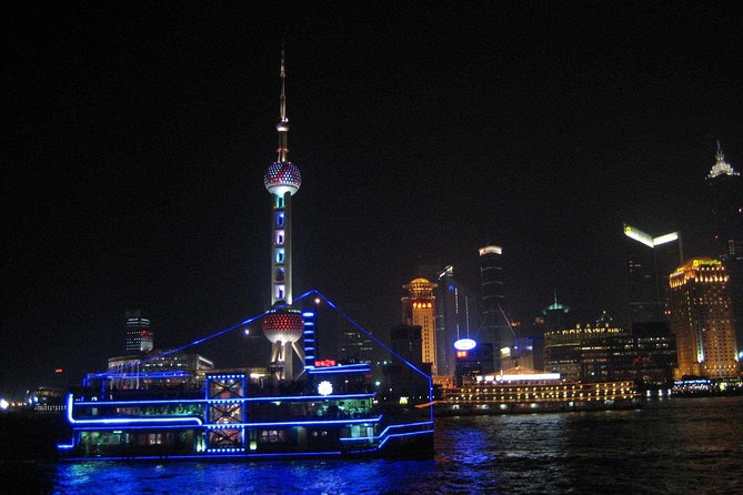 Huangpu River Cruise and Bund City Lights Evening Tour of Shanghai - The Huangpu River cruise: Pudong vs Pu Xi from the deck