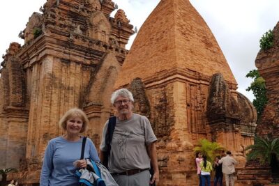 Nha Trang Highly Recommended Private River Cruise by boat - Rural riverside village atmosphere and mountain backdrops