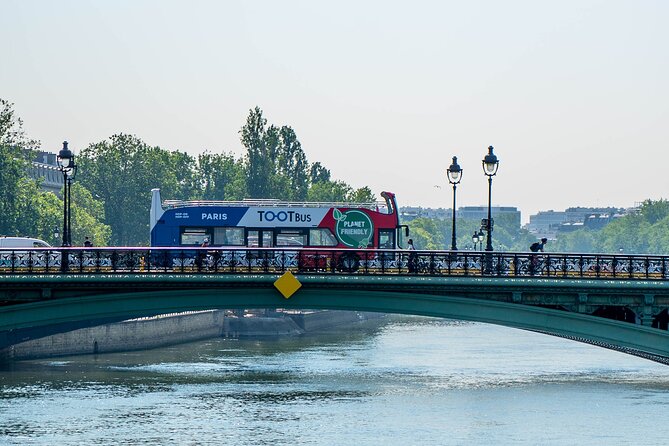 Paris Tootbus Must See Hop-on Hop-off Bus Tour with Seine River Cruise - Audio guides: great for basics, imperfect for deep listening