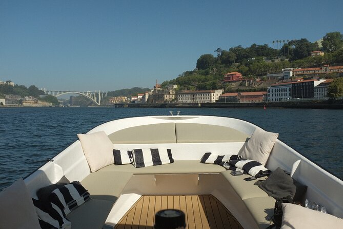 Porto: Douro River Boat Cruise with Port Wine and Snacks - The Guides Drive the Fun: Stories, Captains, and Real Interaction
