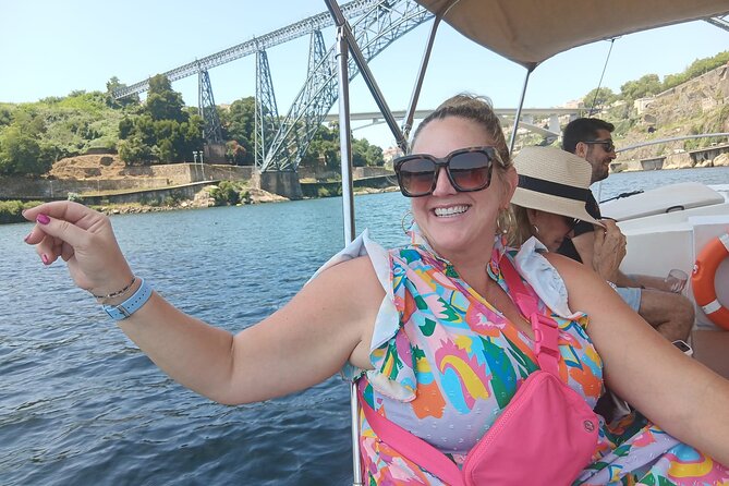 Porto:Douro River boat tour under the 6 bridges - Value math: $44.76 for bridges, port, and a small-group guide
