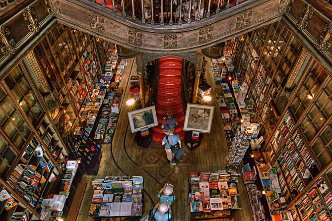 Porto Walking Tour, Lello Bookshop, River Cruise and Cable Car - Douro River cruise: bridge views, Rabelo boats, and photo time