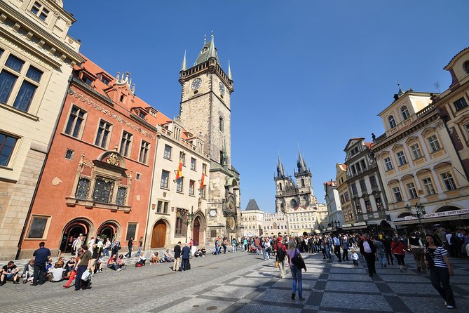 Prague: Grand City Tour with Bus, Castle exteriors & River Cruise - Stop 1: Na Příkopě bus ride toward the Castle area