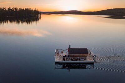 Private Traditional Finnish Sauna Boat Scenic River Cruise - The core experience: cruise first, sauna second, then a lake break