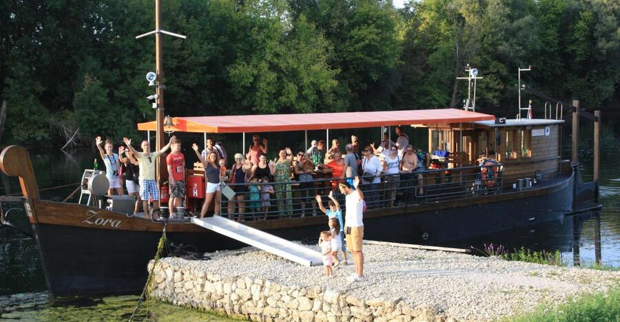Riverboat tour by replica of a traditional Žitna lađa boat - What you’ll see along the river: forests, monastery views, and a sunken-boat story