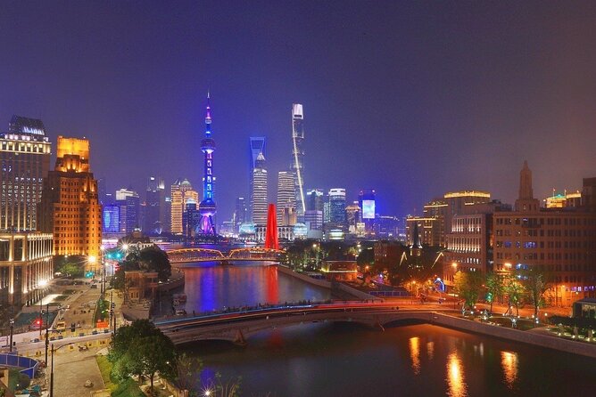 Shanghai Night River Cruise and Light Tour with Yuyuan Bazaar - Yuyuan Old Street: Souvenirs, Architecture, and Street Snacks