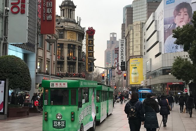 Shanghai Private Night Tour with Huangpu River Cruise, the Bund and Xintiandi - Private Guide Power: From Metro Tickets to Photo Moments