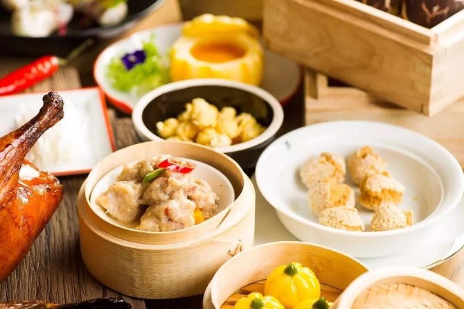 Shanghai Private Tour with River Cruise, Shanghai Tower, and Lunch or Dinner - Pudong food stop: where Shanghai flavors turn into a story