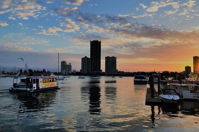 Surfers Paradise: Sightseeing Sunset River Cruise - Boarding at Surfers Paradise River Cruises: deck comfort and quick rules