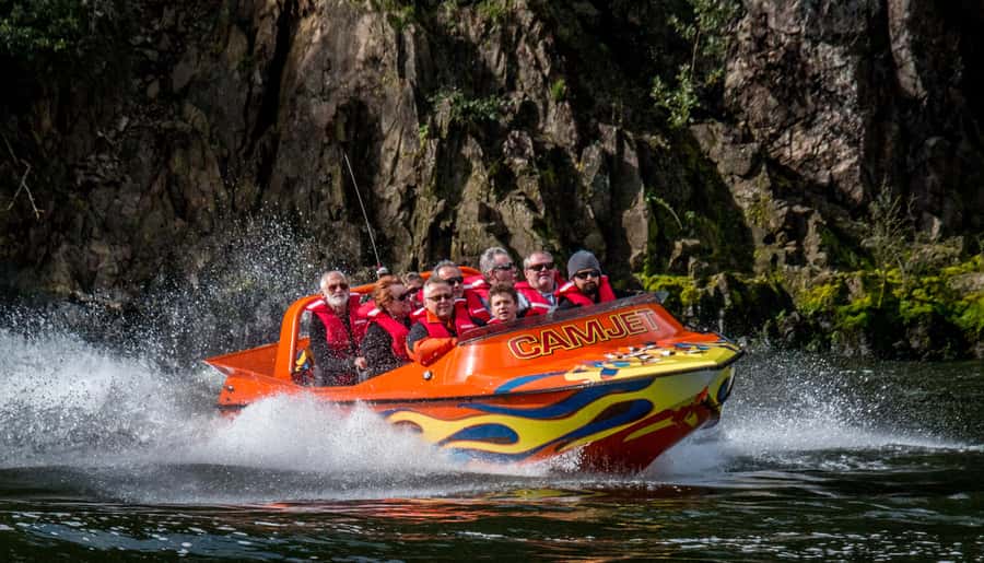 Waikato River: 1-Hour Ecological River Cruise - Getting suited up: rain gear + a life jacket is the starting point